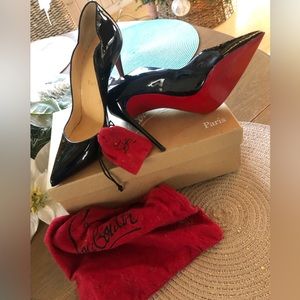 Barely worn Christian Louboutin hot chick black pumps with box and bag